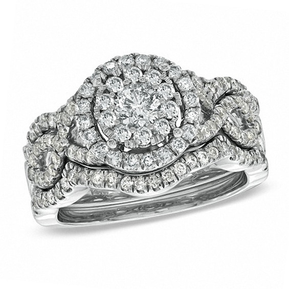 Previously Owned - 1-1/5 CT. T.w. Diamond Cluster Bridal Set in 14K White Gold