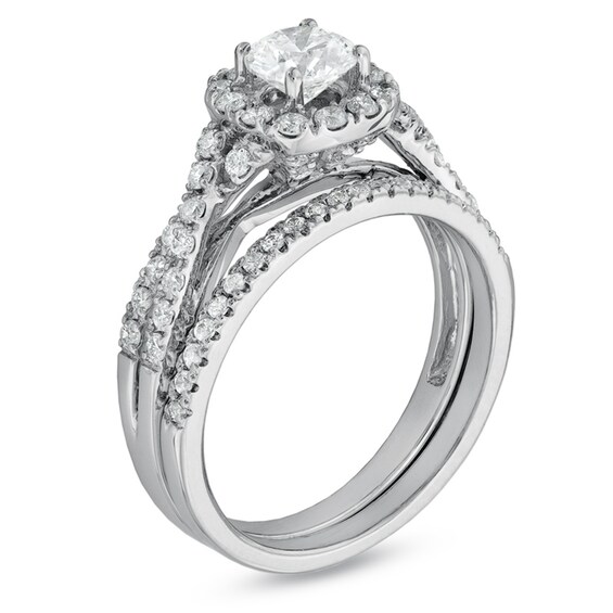Previously Owned - 1 CT. T.w. Diamond Frame Twist Bridal Set in 14K White Gold