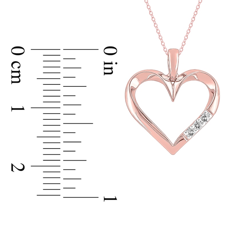 Main Image 2 of Previously Owned - 1/20 CT. T.W. Diamond Three Stone Heart Pendant in 10K Rose Gold