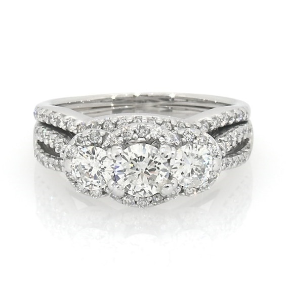 Previously Owned 1-1/2 CT. T.w. Diamond Three Stone Frame Soldered Bridal Set in 14K White Gold