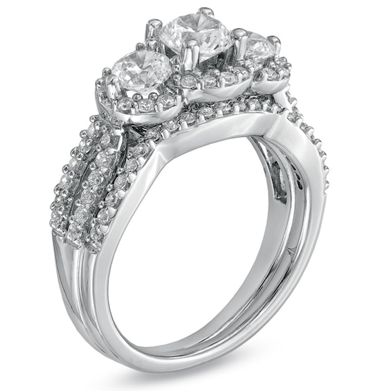 Previously Owned 1-1/2 CT. T.w. Diamond Three Stone Frame Soldered Bridal Set in 14K White Gold