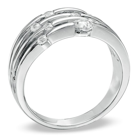 Previously Owned - 1/2 CT. T.w. Diamond Orbit Band in 10K White Gold