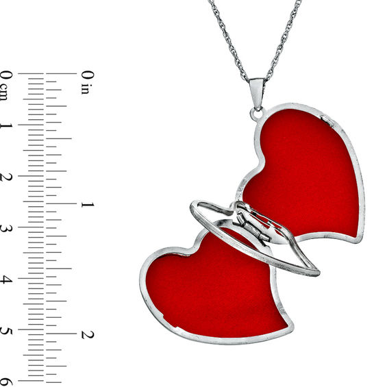 Previously Owned - Tilted Heart Footprints Locket in Sterling Silver