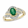 Thumbnail Image 1 of Previously Owned - Oval Emerald and 1/3 CT. T.W. Baguette and Round Diamond Ring in 14K Gold