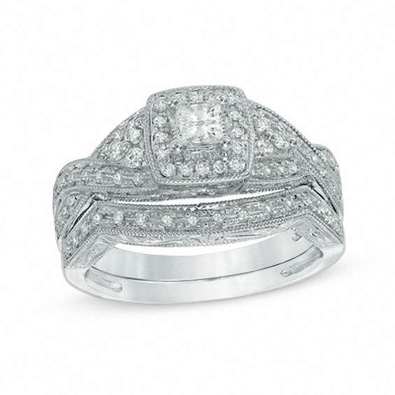 Previously Owned - 1/2 CT. T.w. Princess-Cut Diamond Twist Bridal Set in 14K White Gold