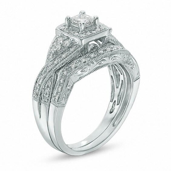 Previously Owned - 1/2 CT. T.w. Princess-Cut Diamond Twist Bridal Set in 14K White Gold