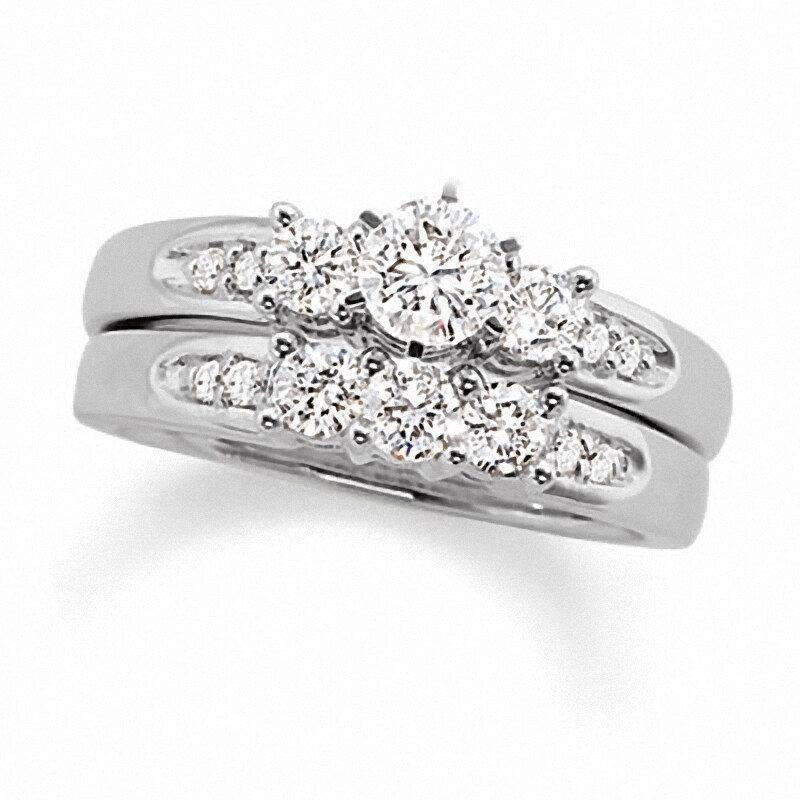 Main Image 1 of Previously Owned 1-1/2 CT. T.W. Diamond Three Stone Soldered Bridal Set in 14K White Gold