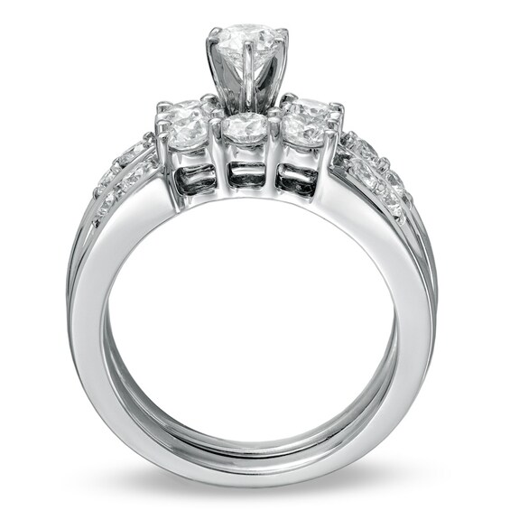 Previously Owned 1-1/2 CT. T.w. Diamond Three Stone Soldered Bridal Set in 14K White Gold