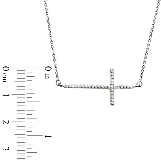 Previously Owned - 1/6 CT. T.w. Diamond Sideways Cross Necklace in 10K White Gold - 17"