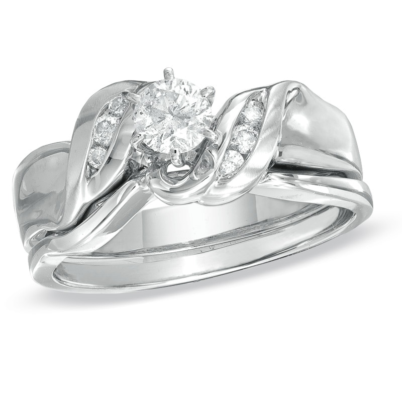 Previously Owned - 1/3 CT. T.W. Diamond Bridal Set in 10K White Gold