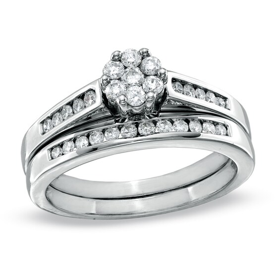 Previously Owned - 1/2 CT. T.w. Diamond Flower Bridal Set in 14K White Gold
