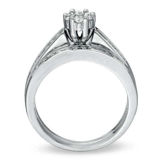 Previously Owned - 1/2 CT. T.w. Diamond Flower Bridal Set in 14K White Gold