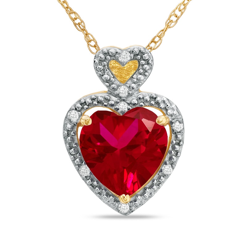 Main Image 1 of Previously Owned - 8.0mm Heart-Shaped Lab-Created Ruby and Diamond Accent Heart Frame Pendant in 10K Gold