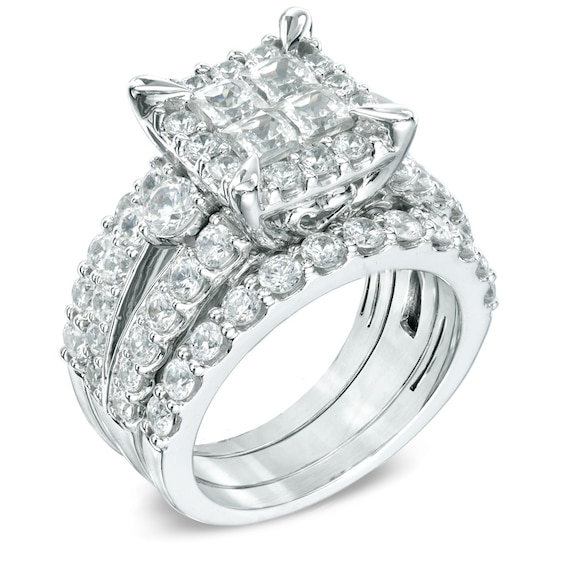 Previously Owned - 4 CT. T.w. Quad Princess-Cut Diamond Frame Bridal Set in 14K White Gold