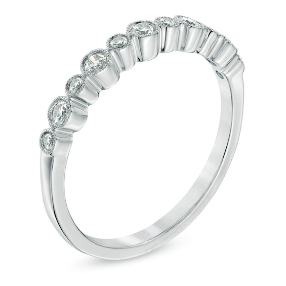 Previously Owned - 1/4 CT. T.w. Diamond Bezel-Set Anniversary Band in 10K White Gold