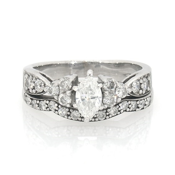 Previously Owned 1 CT. T.w. Marquise Diamond Soldered Bridal Set in 14K White Gold