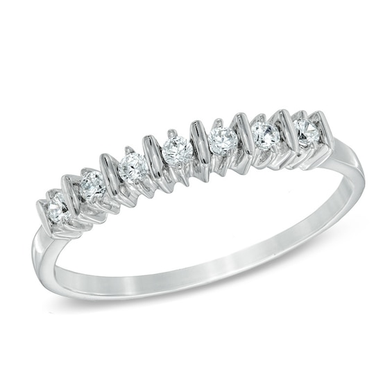 Previously Owned - 1/10 CT. T.w. Diamond Seven Stone Wedding Band in 10K White Gold