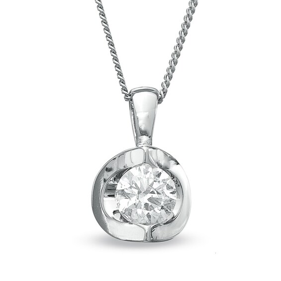 Previously Owned - 1/5 CT. Canadian Diamond Solitaire Pendant in 14K White Gold (I/I2)