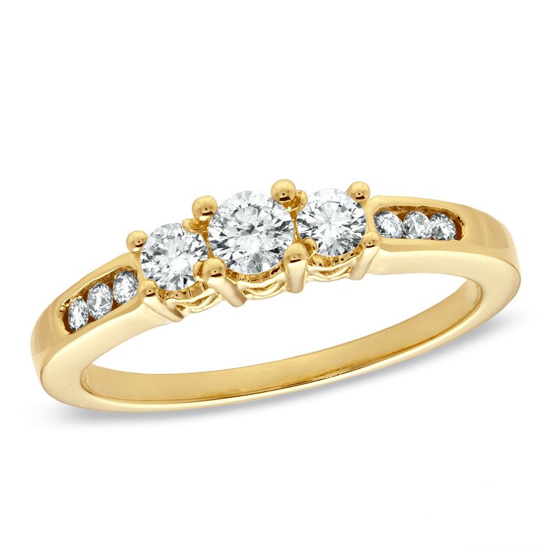 Main Image 1 of Previously Owned - 1/2 CT. T.W. Diamond Past Present Future® Ring in 14K Gold