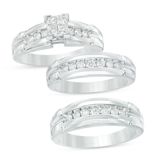 Previously Owned - 3/4 CT. T.w. Quad Diamond Comfort Fit Wedding Ensemble in 14K White Gold
