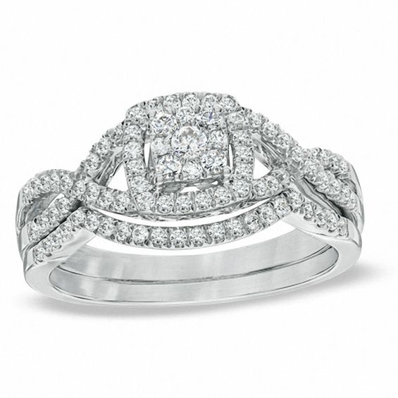 Previously Owned - 1/2 CT. T.w. Cushion-Shaped Multi-Diamond Twist Shank Bridal Set in 10K White Gold