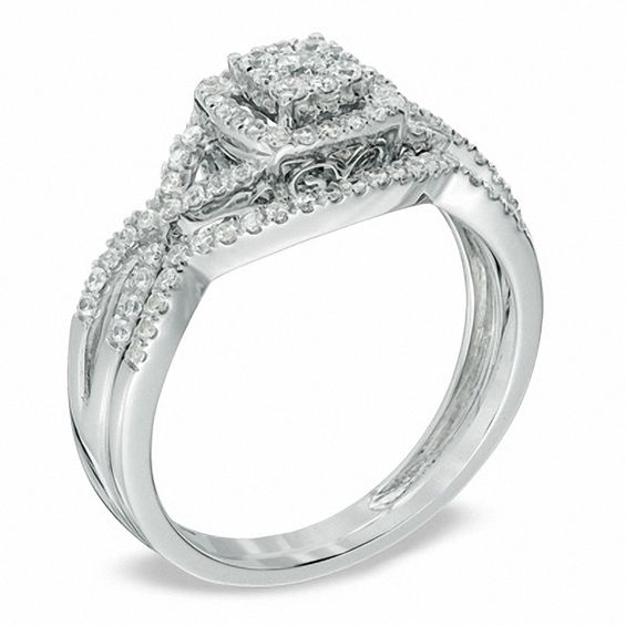 Previously Owned - 1/2 CT. T.w. Cushion-Shaped Multi-Diamond Twist Shank Bridal Set in 10K White Gold
