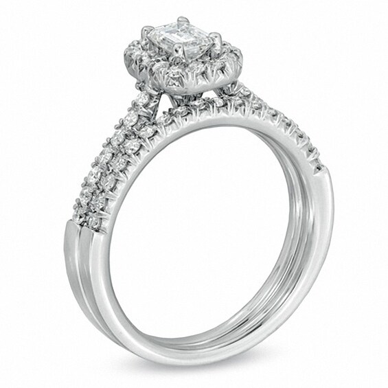Previously Owned - 3/4 CT. T.w. Emerald-Cut Diamond Frame Bridal Set in 14K White Gold