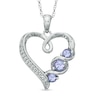 Thumbnail Image 1 of Previously Owned - Tanzanite and Diamond Accent Swirl Heart Pendant in Sterling Silver