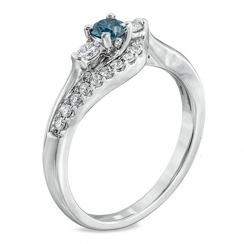 Main Image 2 of Previously Owned - 1/2 CT. T.W. Enhanced Blue and White Diamond Three Stone Wave Ring in 10K White Gold