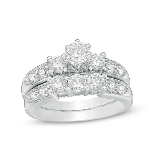 Previously Owned - 2 CT. T.w. Diamond Three Stone Bridal Set in 14K White Gold