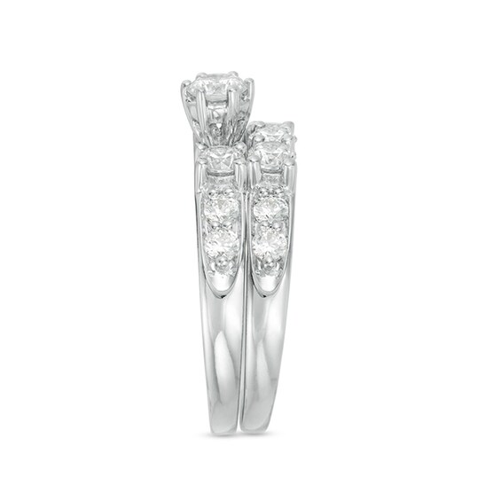 Previously Owned - 2 CT. T.w. Diamond Three Stone Bridal Set in 14K White Gold