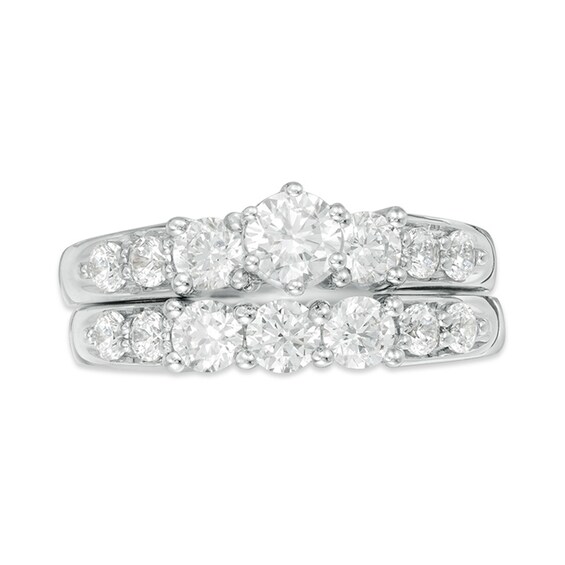 Previously Owned - 2 CT. T.w. Diamond Three Stone Bridal Set in 14K White Gold