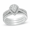 Thumbnail Image 1 of Previously Owned - 1/2 CT. T.W. Diamond Cluster Pear-Shaped Frame Three Piece Bridal Set in 10K White Gold