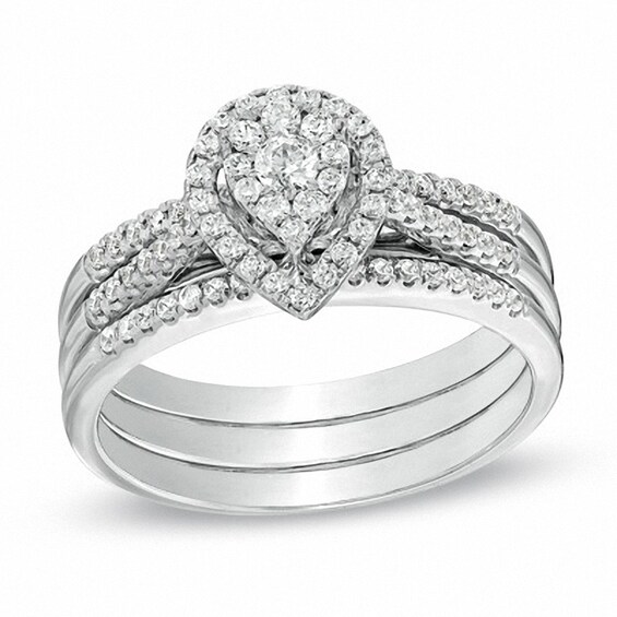 Previously Owned - 1/2 CT. T.w. Diamond Cluster Pear-Shaped Frame Three Piece Bridal Set in 10K White Gold