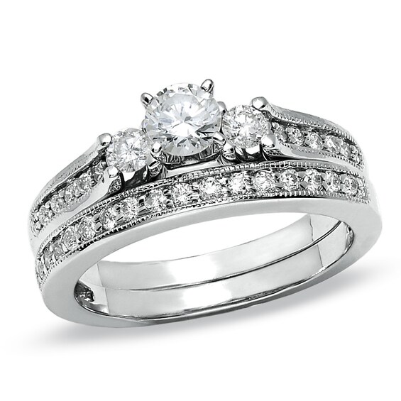 Previously Owned - 3/4 CT. T.w. Diamond Three Stone Bridal Set in 14K White Gold