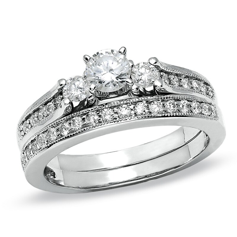 Main Image 1 of Previously Owned - 3/4 CT. T.W. Diamond Three Stone Bridal Set in 14K White Gold