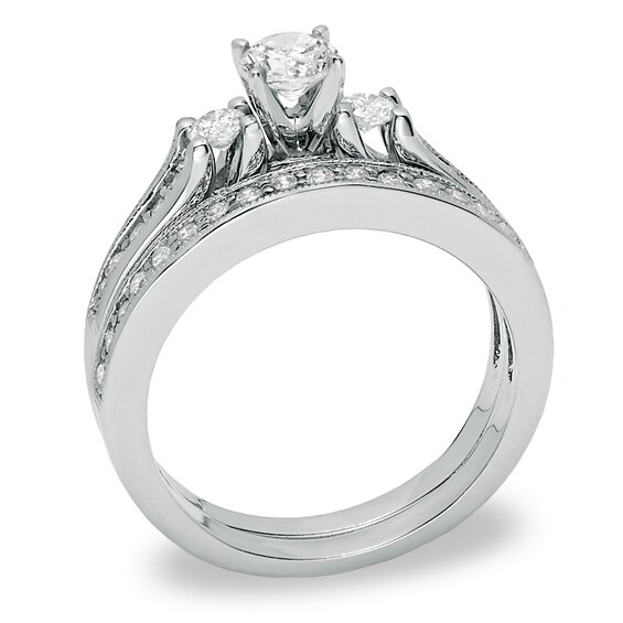 Previously Owned - 3/4 CT. T.w. Diamond Three Stone Bridal Set in 14K White Gold