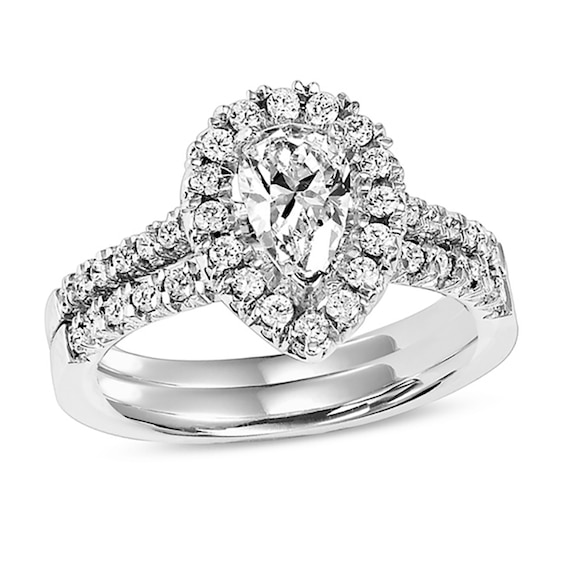 Previously Owned - 3/4 CT. T.w. Pear-Shaped Diamond Frame Bridal Set in 14K White Gold