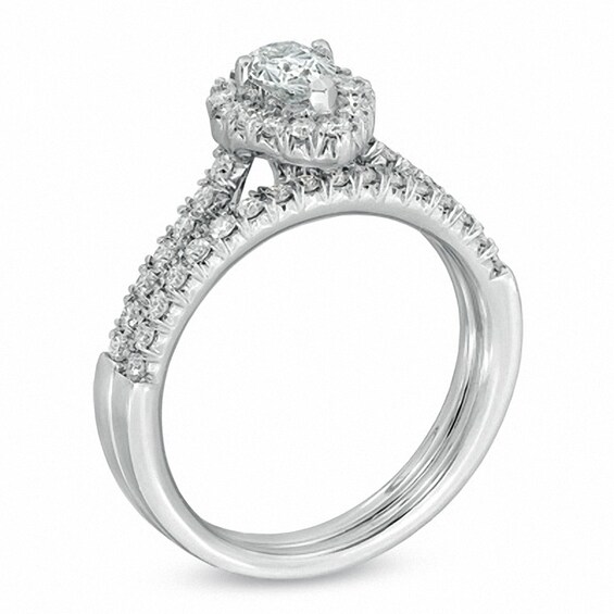 Previously Owned - 3/4 CT. T.w. Pear-Shaped Diamond Frame Bridal Set in 14K White Gold