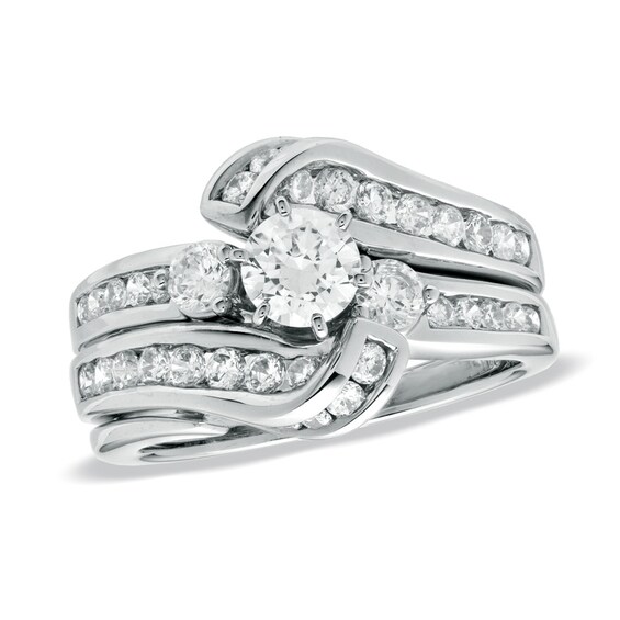 Previously Owned - 1-1/2 CT. T.w. Diamond Three Stone Bridal Set in 14K White Gold