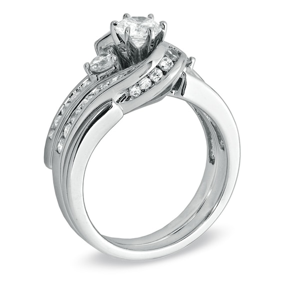 Previously Owned - 1-1/2 CT. T.w. Diamond Three Stone Bridal Set in 14K White Gold