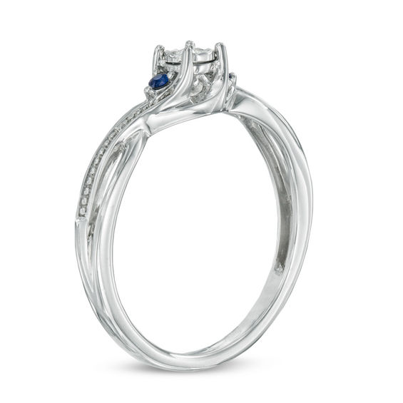 Previously Owned - Cherished Promise Collectionâ¢ Diamond Accent and Blue Sapphire Twist Ring in Sterling Silver