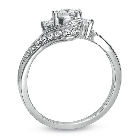 Previously Owned - 1/2 CT. T.w. Diamond Three Stone Swirl Ring in 10K White Gold