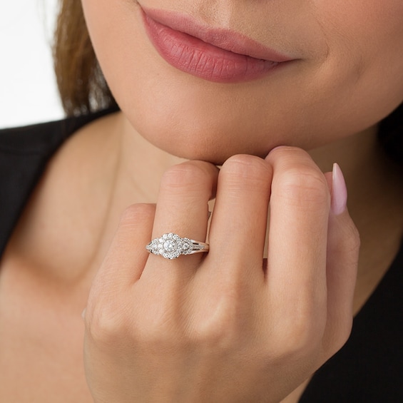 Previously Owned - 1/2 CT. T.w. Diamond Three Stone Frame Ring in 14K White Gold