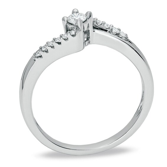 Previously Owned - 1/5 CT. T.w. Diamond Twist Pavé Promise Ring in 14K White Gold