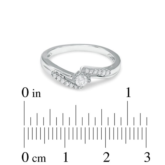 Previously Owned - 1/5 CT. T.w. Diamond Twist Pavé Promise Ring in 14K White Gold