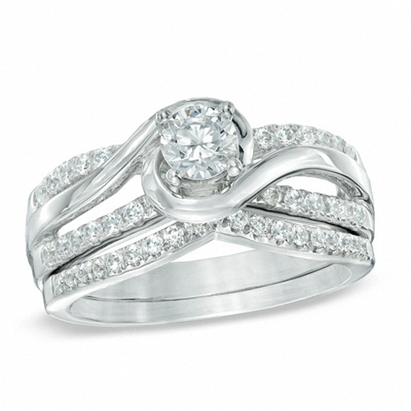 Main Image 1 of Previously Owned - 3/4 CT. T.W. Diamond Swirl Bridal Set in 14K White Gold
