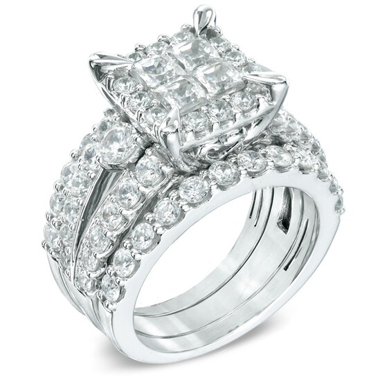 Previously Owned - 4 CT. T.w. Quad Princess-Cut Diamond Frame Bridal Set in 14K White Gold