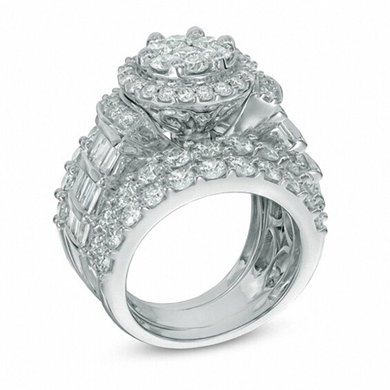 Previously Owned - 5 CT. T.w. Diamond Cluster Frame Three Piece Bridal Set in 14K White Gold