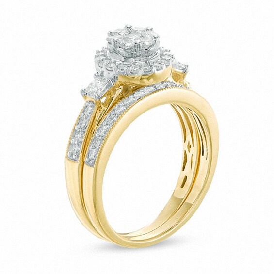 Previously Owned - 1 CT. T.w. Diamond Cluster Frame Bridal Set in 10K Gold
